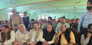 DyCM Surinder Choudhary and other senior NC leaders during a function in Jammu.