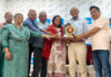 Dogri writer Ritu Singh receiving Prof. Ramnath Shastri Memorial Award 2026 during a function in Jammu.