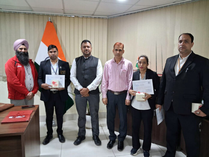 Northern Railway’s ticket checking staff posing with Senior Divisional Commercial Manager Uchit Singhal after being honoured by the latter. Northern Railway’s ticket checking staff posing with Senior Divisional Commercial Manager Uchit Singhal after being honoured by the latter.