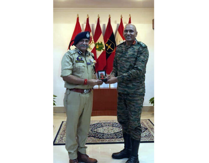 Northern Army Commander Lt Gen Pratik Sharma felicitating DIG Shiv Kumar Sharma with Operation Sindoor Medal in Udhampur on Wednesday.