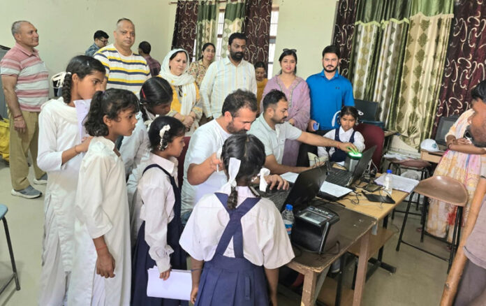 Students during Aadhaar Enrollment and Update Camp at Government School Gandhi Nagar, Jammu.