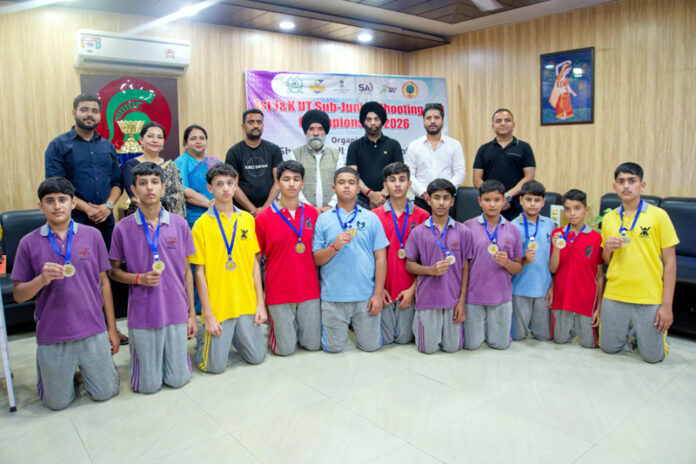 Winners posing along with dignitaries during prize distribution ceremony.
