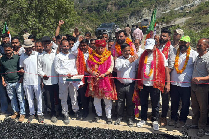 MLA Ramnagar, Dr Sunil Bhardwaj inaugurating the blacktopping work of Barta-Chanunta-Bhugtrian road.