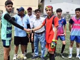 Team captains shaking hands before a match in Nagrota on Monday.