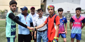 Team captains shaking hands before a match in Nagrota on Monday.