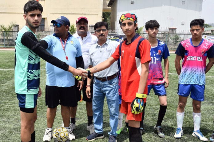 Team captains shaking hands before a match in Nagrota on Monday.