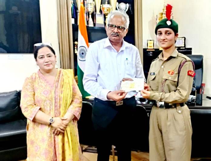 Cadet Suhani Koul posing along with College Management.