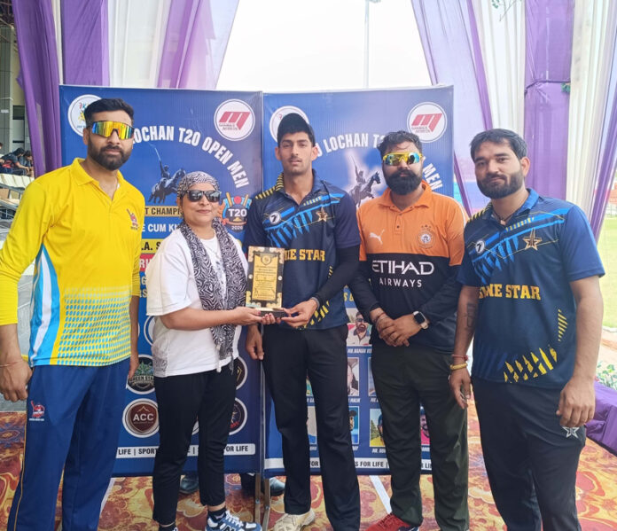 Dignitary presenting player of the match award during post-match presentation.