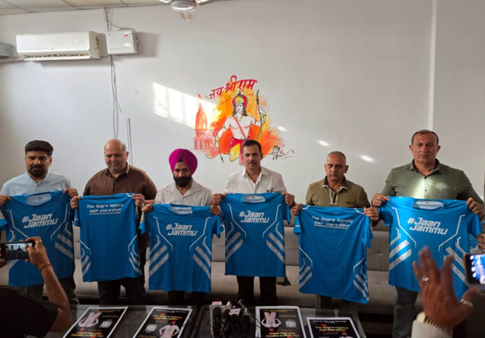 Dignitaries unveiling Dogra Legacy Half Marathon jersey during an event on Friday.