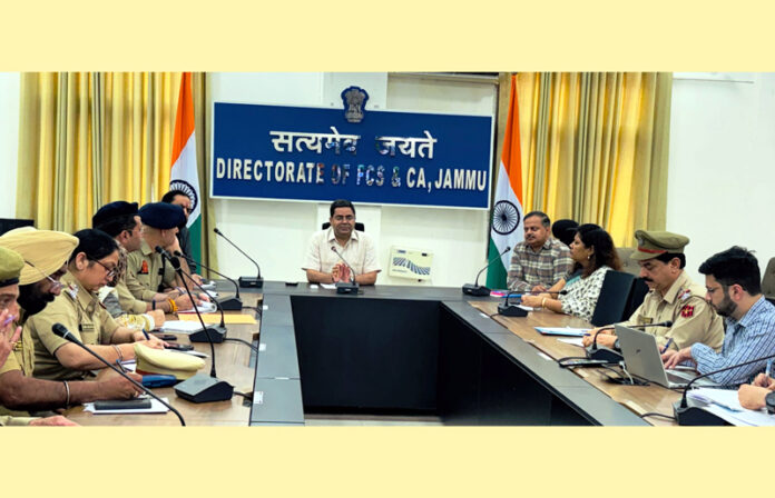 Director Food, Civil Supplies & Consumer Affairs Rajesh Kumar Shavan chairing a meeting on Wednesday.