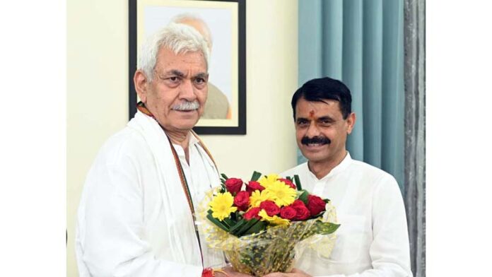 MLA Satish Sharma meeting LG Manoj Sinha on Wednesday.