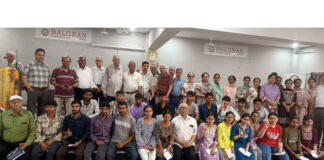 Balgran management posing with meritorious students during the felicitation ceremony.