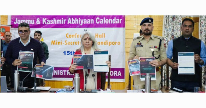 Dignitaries during interactive programme at Bandipora on Thursday.