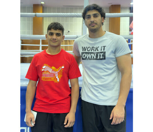 Mohd Yasser posing along with his coach Mohd Ishtyaq.