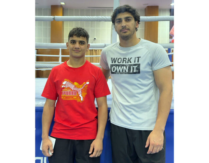 Mohd Yasser posing along with his coach Mohd Ishtyaq.