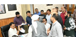 Minister Javed Rana listens to public delegations at Civil Secretariat in Jammu.