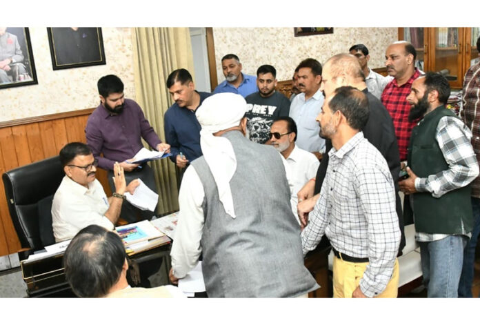 Minister Javed Rana listens to public delegations at Civil Secretariat in Jammu.