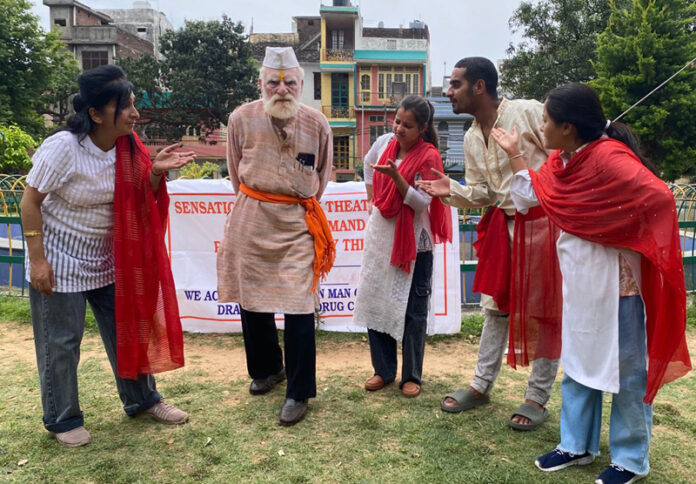 ESRM artists performing during street play 'Nasha Mukt Banana Hai' in Jammu on Tuesday.