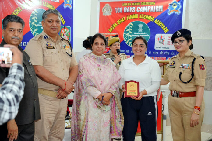 A participant being presented with a memento during an awareness programme at 15 IR Battalion headquarters in Jammu on Thursday.
