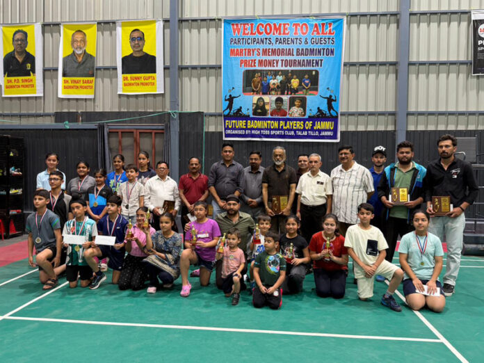 Winners posing along with dignitaries during closing ceremony.