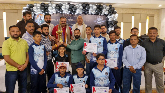 Winning team posing along with dignitaries.