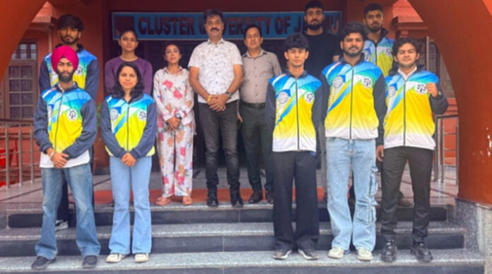 Wushu players posing along with Director of Physical Education and Sports, Cluster University of Jammu.