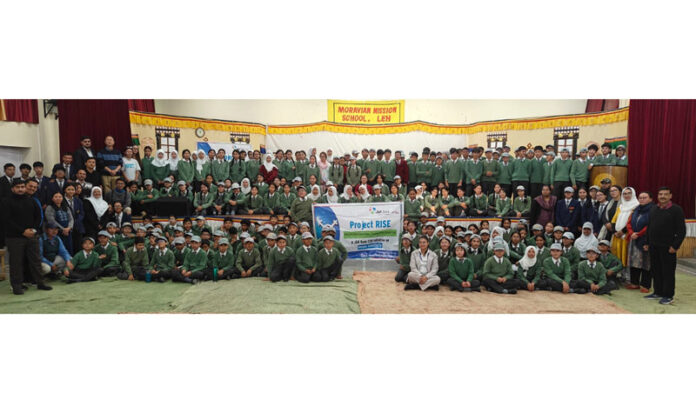 School students posing together during an awareness session organized under Project RISE.