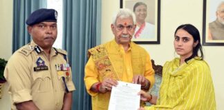 LG Manoj Sinha handing over appointment letter to the wife of martyr Sub-Inspector Deepak Sharma on Thursday.