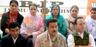 Union Minister Rajyavardhan Singh Rathore along with LoP Sunil Sharma during a press conference at Srinagar on Thursday.