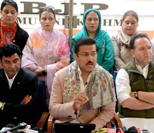 Union Minister Rajyavardhan Singh Rathore along with LoP Sunil Sharma during a press conference at Srinagar on Thursday.