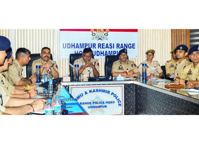 IGP Jammu, Bhim Sen Tuti, and DIG UR Range, Shiv Kumar Sharma, chairing a meeting of police officers in Udhampur district on Monday.