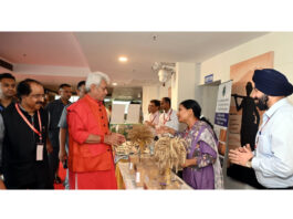 LG inspecting a stall at SKUAST Jammu on Tuesday.