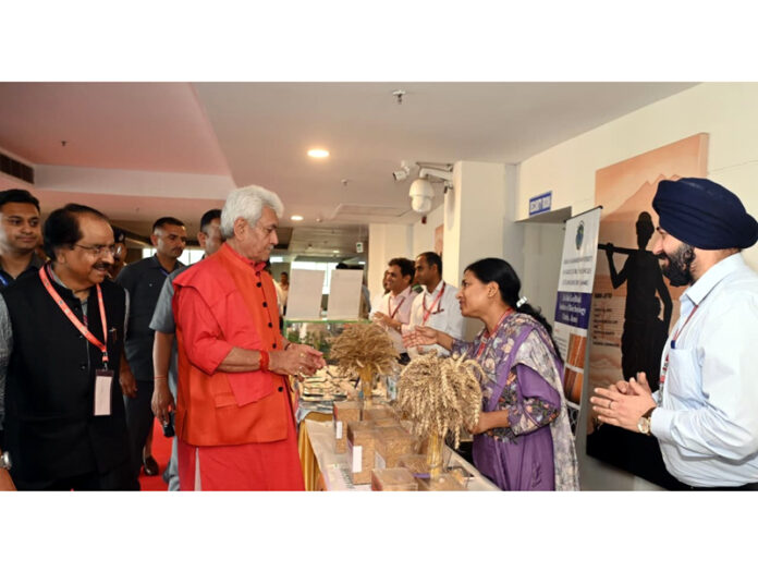 LG inspecting a stall at SKUAST Jammu on Tuesday.