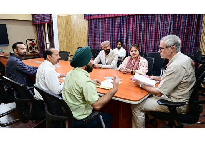 CM Omar Abdullah meeting a delegation at Jammu on Friday.