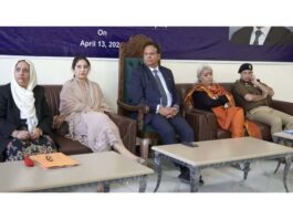 Justice Wasim Sadiq Nargal chairing a meeting at Bandipora on Monday.