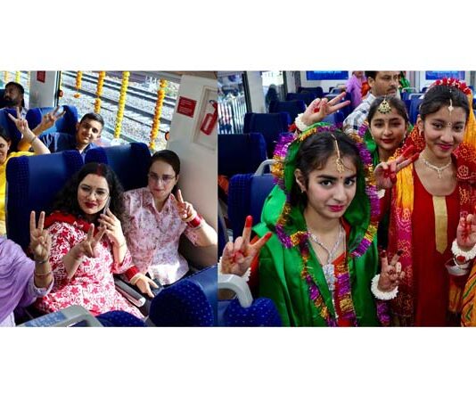 Passengers on board Vande Bharat from Jammu to Srinagar expressing their joyous experience on Thursday. -Excelsior/Rakesh
