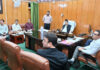 Speaker LA chairing a meeting on Wednesday.