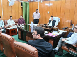 Speaker LA chairing a meeting on Wednesday.
