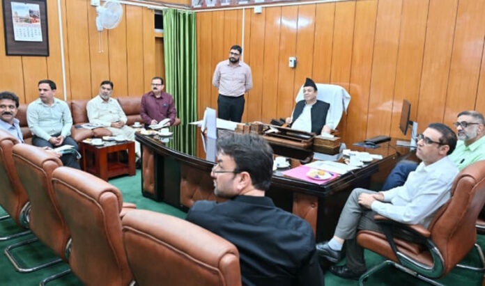Speaker LA chairing a meeting on Wednesday.