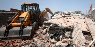 An alleged drug peddler's property being demolished at Miran Sahib area in Jammu district on Friday. -Excelsior/Rakesh