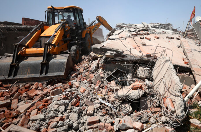 An alleged drug peddler's property being demolished at Miran Sahib area in Jammu district on Friday. -Excelsior/Rakesh