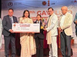 Justice Wasim Sadiq Nargal presenting prize during Moot Court Competition at LPU on Friday.
