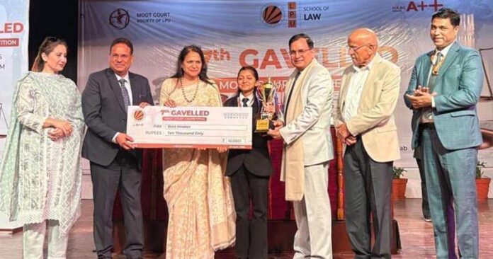 Justice Wasim Sadiq Nargal presenting prize during Moot Court Competition at LPU on Friday.