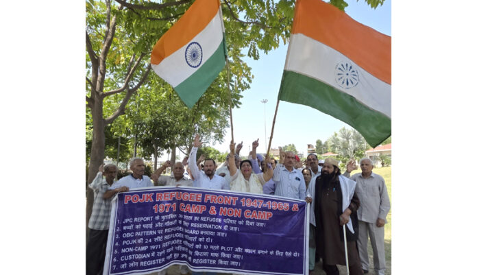 POJK DPs staging protest at Maharaja Hari Singh Park in Jammu on Friday. -Excelsior/Rakesh