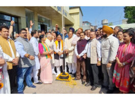 BJP president and MP, Sat Sharma along with party general secretary, (Org), Ashok Koul and other senior leaders hoisting the party flag at BJP Headquarters, Trikuta Nagar on Monday. — Excelsior/Rakesh