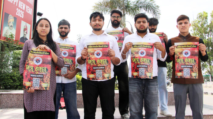 ABVP activists displaying poster of April 22 Sammelan.