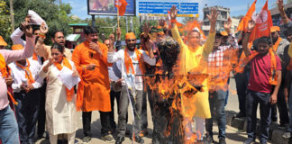 Workers of Shiv Sena torching an effigy during a protest demonstration in Jammu on Friday.