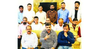 Pawan Khajuria addressing a press conference in Udhampur.