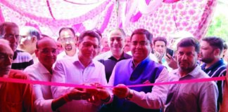 Director FCS&CA and Relief Commissioner starting ration distribution under Special Relief Scheme on Saturday.