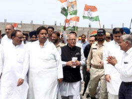 Senior Cong leaders T H Karra, Raman Bhalla, Hari Singh Chib and others during public rally in R S Pura on Sunday.